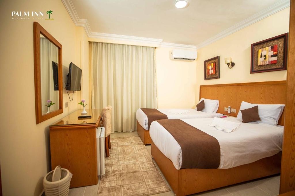 PALM INN SUITES HOTEL